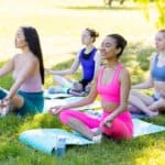 women practicing yoga