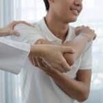 man receiving physiotherapy